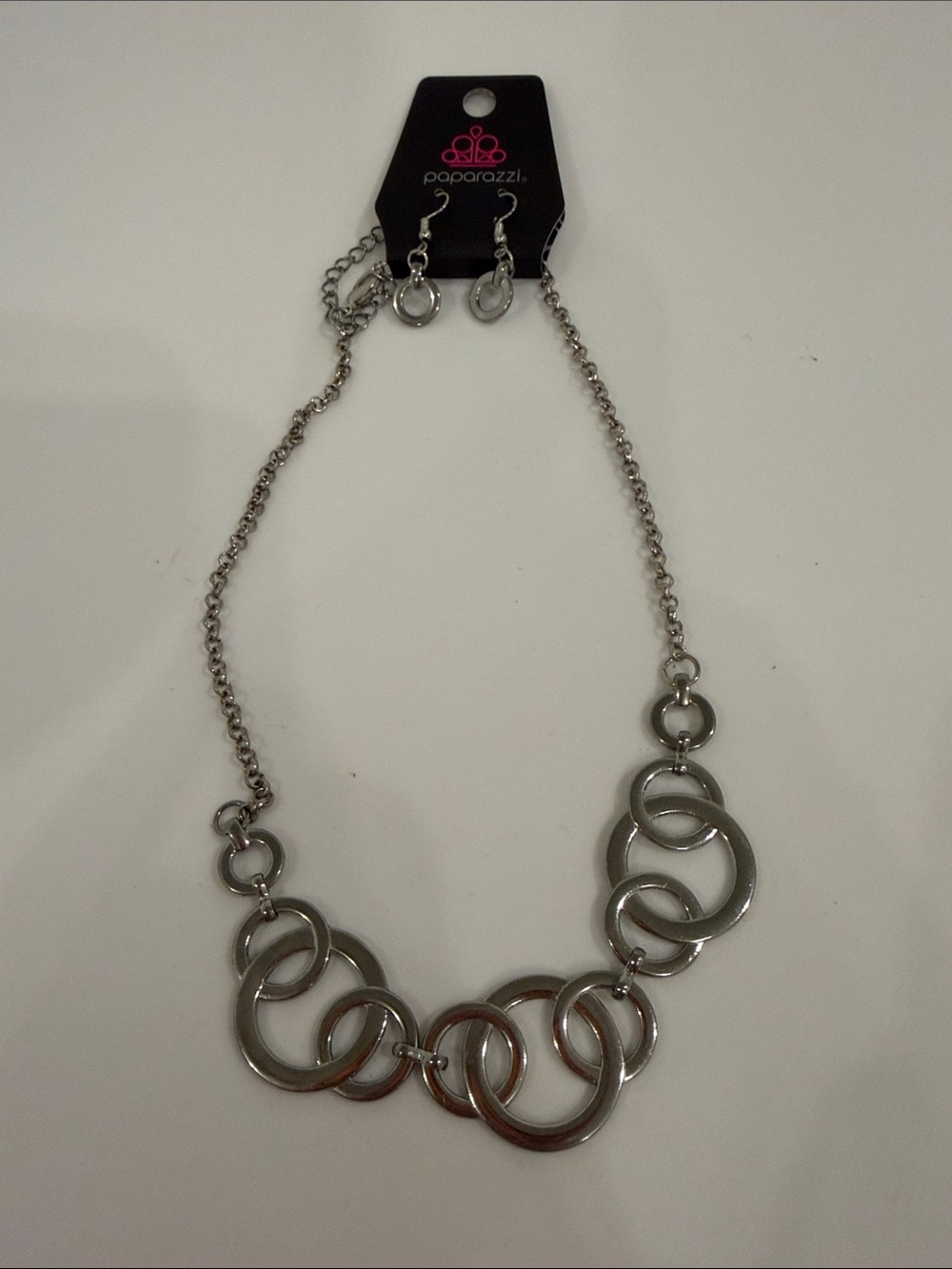 paparazzi Shiny Silver Interlocking Ring Necklace with Matching Drops